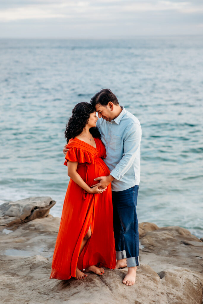 San Diego maternity image with pregnant mother and husband on the beach
