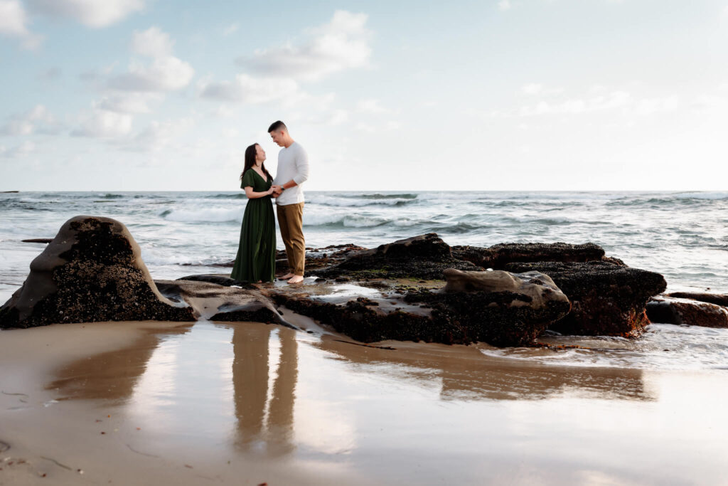 Couple standing together at Windansea Beach